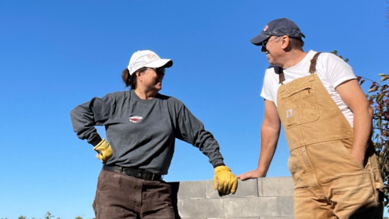 Bernard and Michelle building a pizza oven